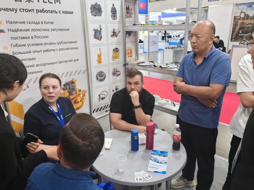 A customer discussion at an industry exhibition