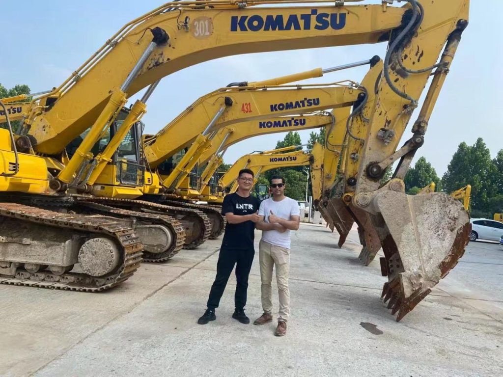 Visitors at the construction equipment yard