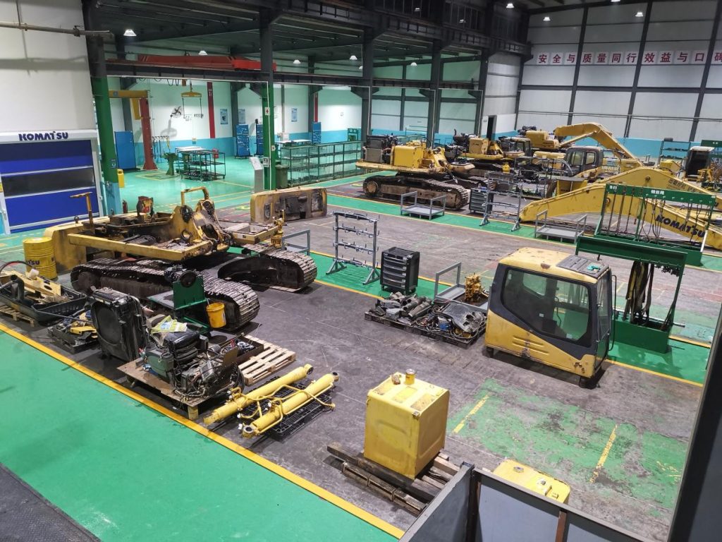 Construction machinery in the service workshop